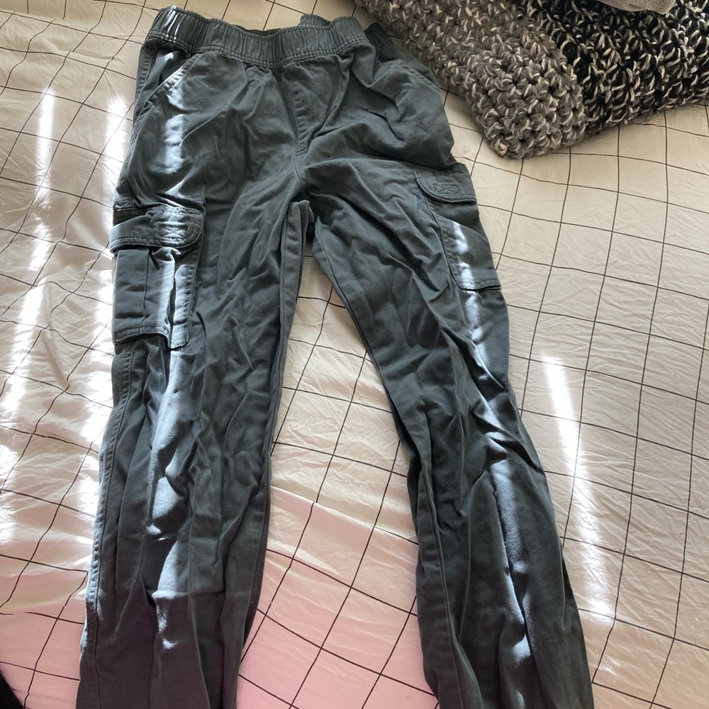 Grey, long, size 14 boys pants. Has pockets on legs and in the back